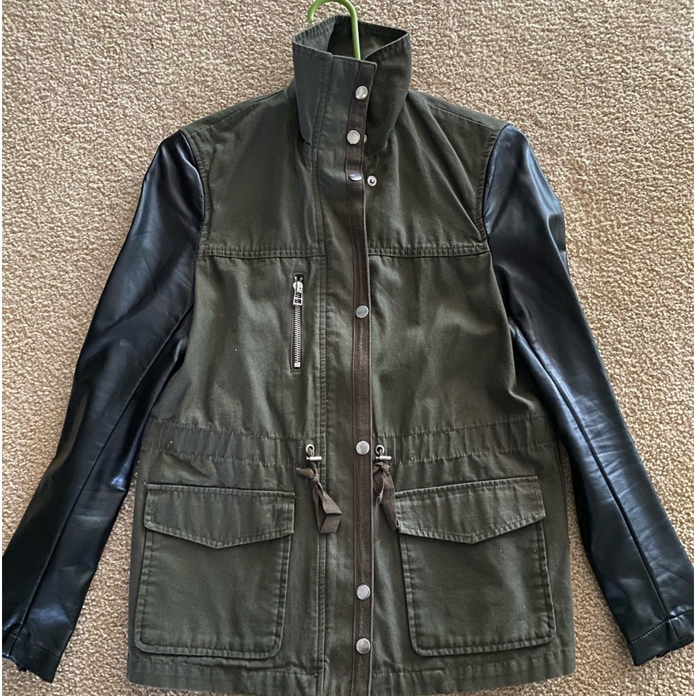 Forever 21 lightweight jacket with faux black leather sleeves. Can tighten waist